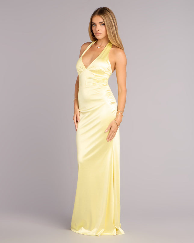 This yellow prom dress, the Ariyah Satin Halter Mermaid Dress , features a sleek, floor-length design with trend-forward details that capture the excitement of Prom 2026.