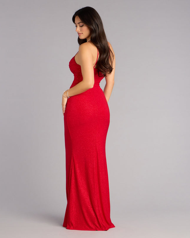 The Katalia Glitter Mermaid Dress is a red prom dress that blends trend-forward design with a flattering fit, perfect for celebrating your night with confidence.