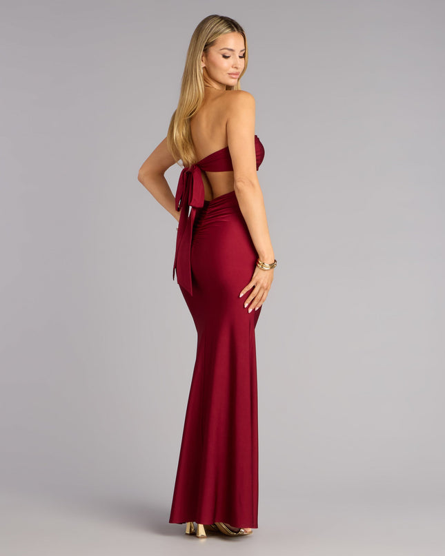 The Monae Tie-Back Mermaid Formal Dress is a wine prom dress that blends trend-forward design with a flattering fit, perfect for celebrating your night with confidence.