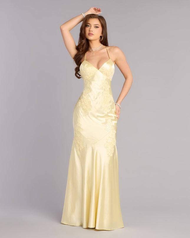 Shop a formal dress like the Rachel Satin Open Back Formal Dress in yellow, designed with a sleek silhouette, luxe fabric, and elegant detail for special events.