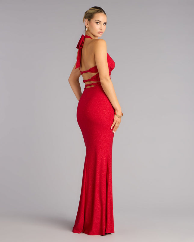 Own any formal or milestone moment in the Maribeth Glitter Strappy Back Mermaid Formal Dress, a red glitter dress designed for bold, spotlight-stealing style.