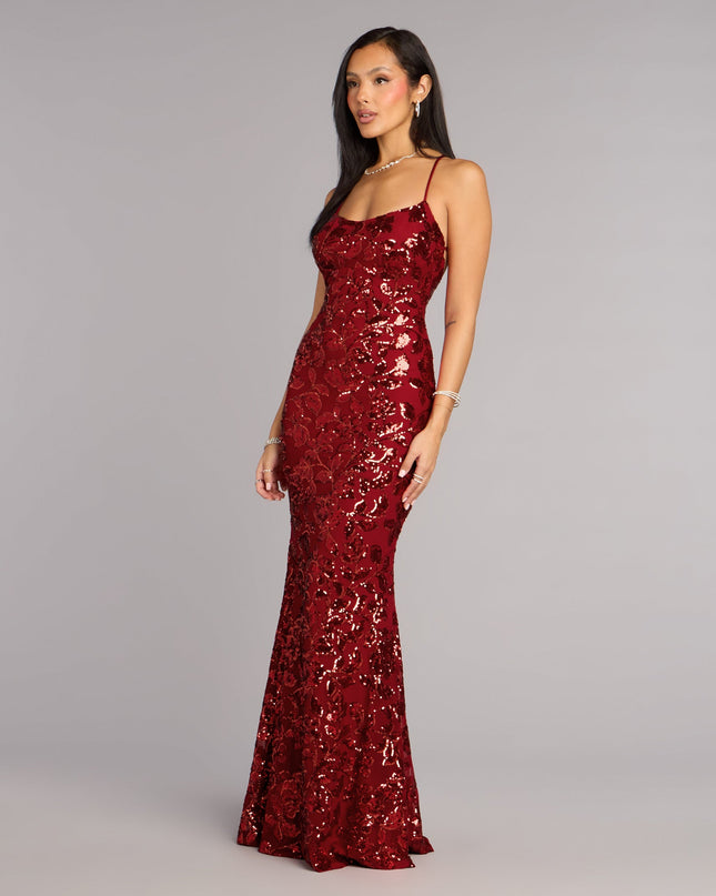 This red prom dress, the Betty Sequin Strappy Mermaid Formal Dress , features a sleek, floor-length design with trend-forward details that capture the excitement of Prom 2026.