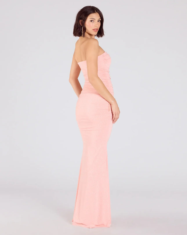 Make a bold statement in the Mischka Strapless Mermaid Glitter Formal Dress in coral, the perfect Windsor dress for weddings, cocktail hours, nights out, and/or seasonal celebrations.