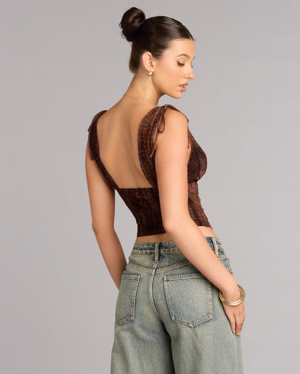 Choose a corset top like the Caught Your Eye Flocked Velvet Corset Top in brown, designed to enhance your silhouette with modern style through a structured bodice and contoured fit.