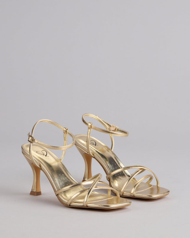 Style made simple with the Shine Hour Metallic Strappy Stiletto Heels, trendy women’s shoes that take your outfit from basic to bold in one step.